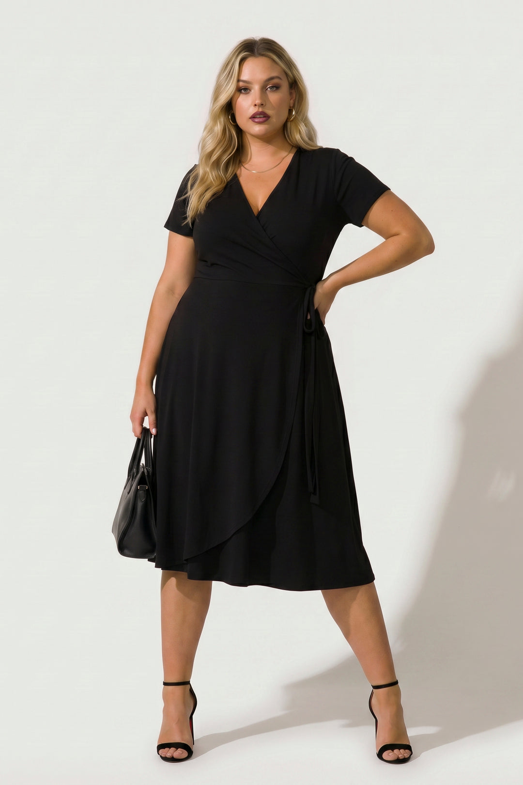 Plus Size Timeless Wrap Dress- Black 3X / Black at Curvy Sense Plus Size Timeless Wrap Dress- Black 3X / Black at Curvy Sense